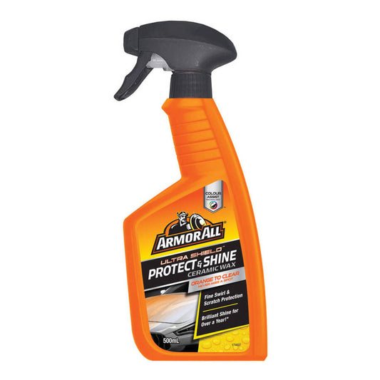 A spray bottle of Armor All Ultra Shield Ceramic Wax Protect & Shine with a black spray nozzle and an orange label on a white background.