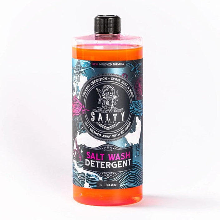 A bottle of Salty Captain Salt Wash Detergent with a colorful label featuring marine-themed graphics.