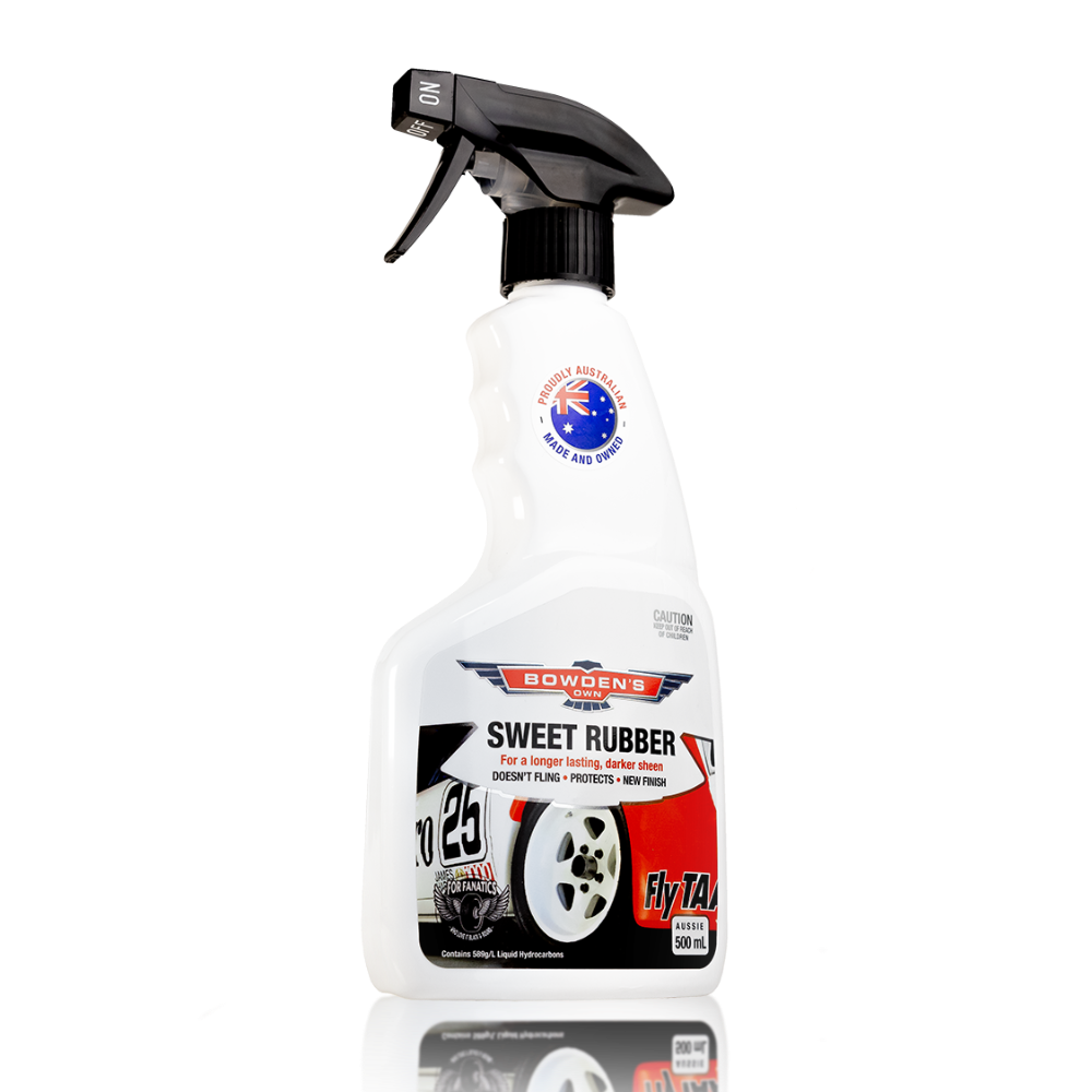 A bottle of Bowden's Own Sweet Rubber Tyre Shine with a spray nozzle, predominantly white with product information and branding.