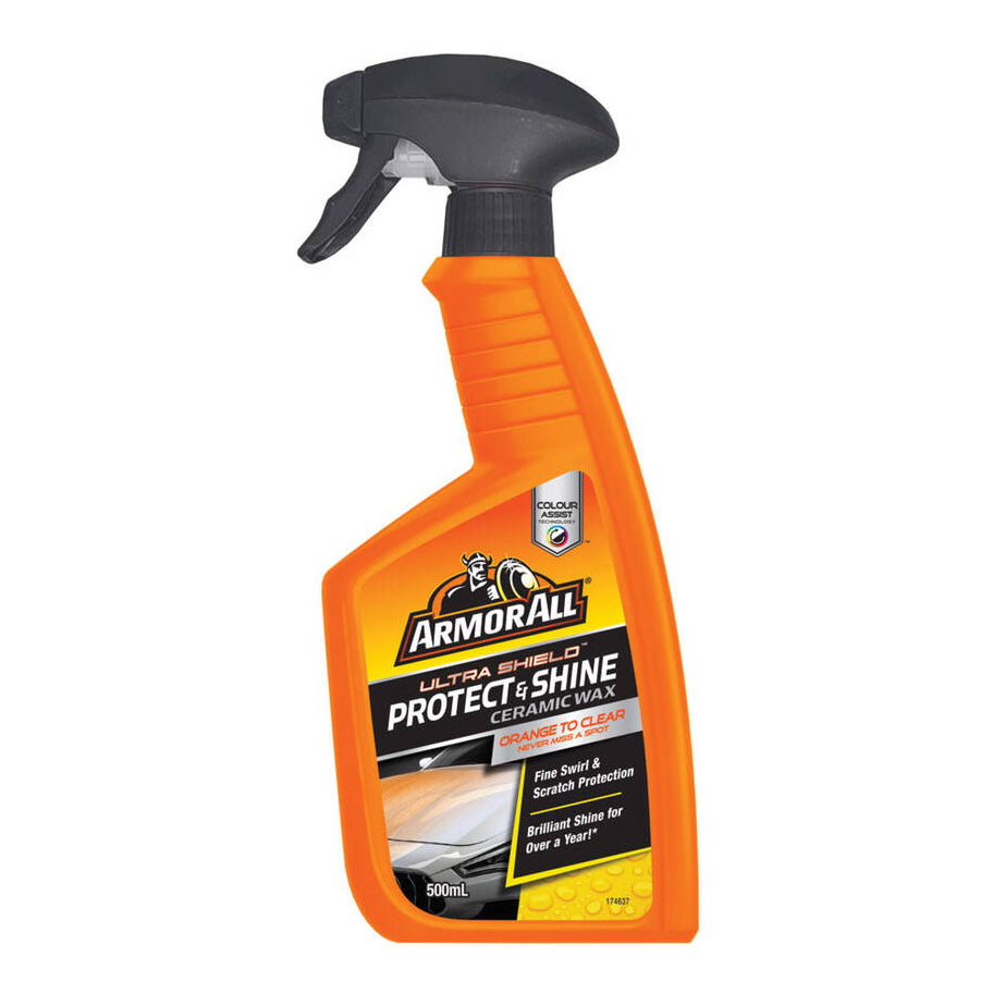A spray bottle of Armor All Ultra Shield Ceramic Wax Protect & Shine with a black spray nozzle and an orange label on a white background.