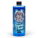 A blue bottle of Salty Captain Engine Flush with product details and branding on the label.