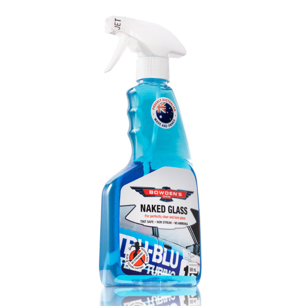 A blue spray bottle labeled 'Bowden's Own Naked Glass' for cleaning glass surfaces.