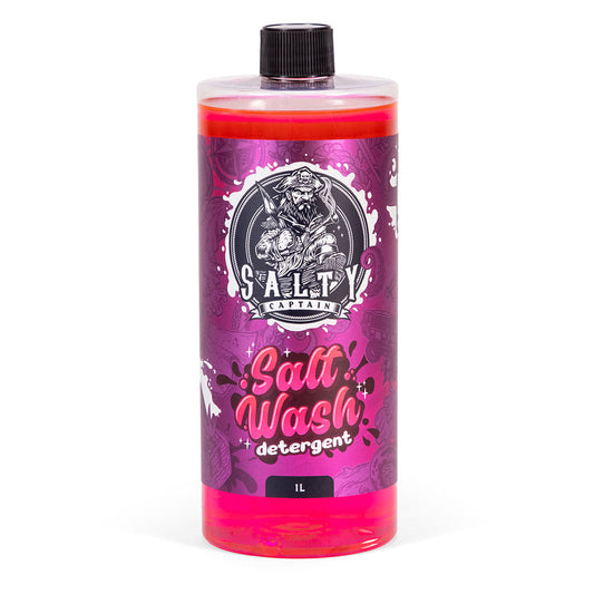 A red bottle of Salty Captain Salt Wash detergent with a label featuring a white cartoon captain character and text indicating the product is a 1L bottle for cleaning boats and vehicles.