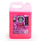 Pink detergent container with a label on a white background